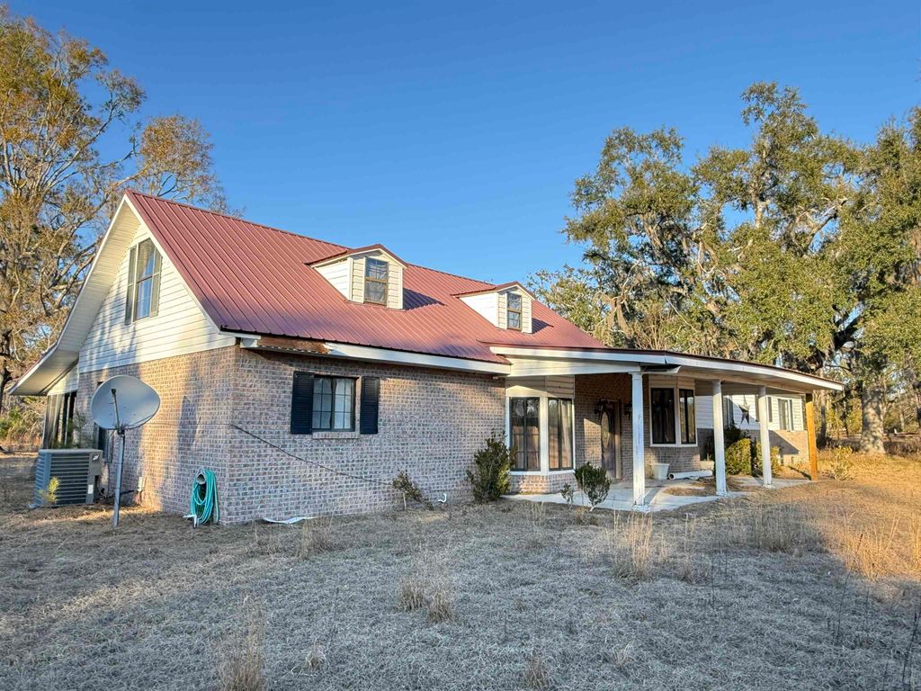 Photo of 1660 W LYMAN HENDRY Road, Perry, FL 32347 (MLS # 395566)