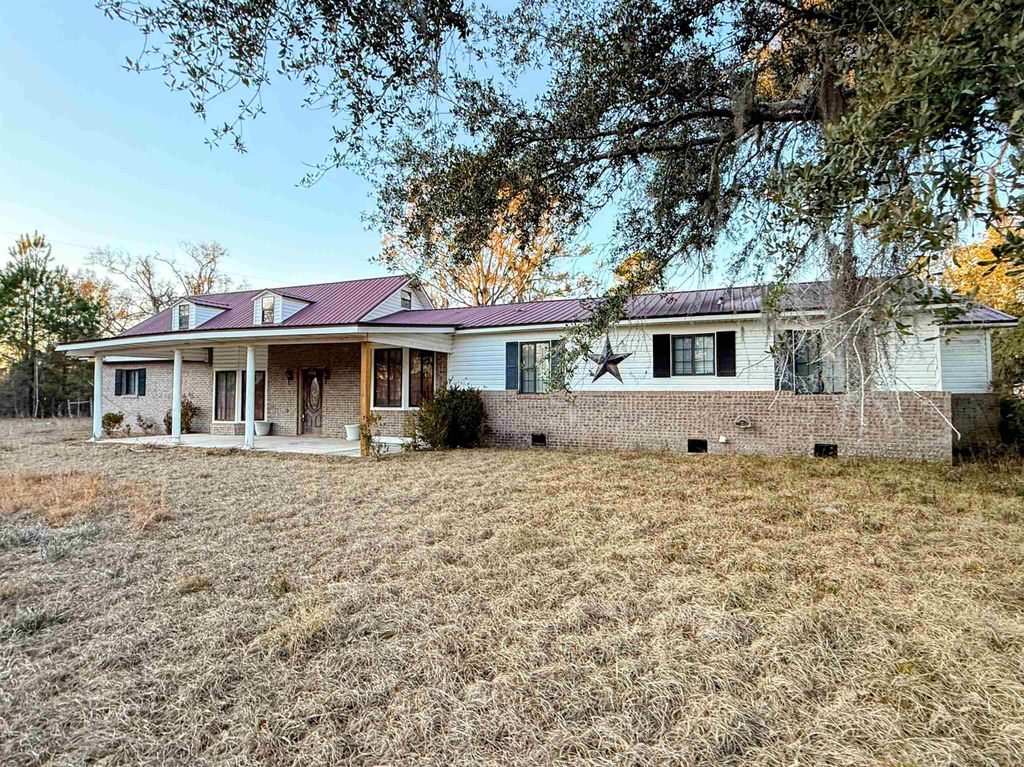 Photo of 1660 W LYMAN HENDRY Road, Perry, FL 32347 (MLS # 395566)