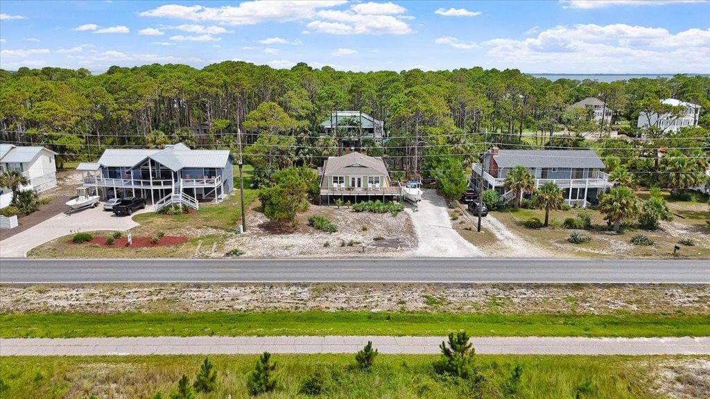 Photo of 549 E Gulf Beach Drive, St George Islan, FL 32328 (MLS # 390062)
