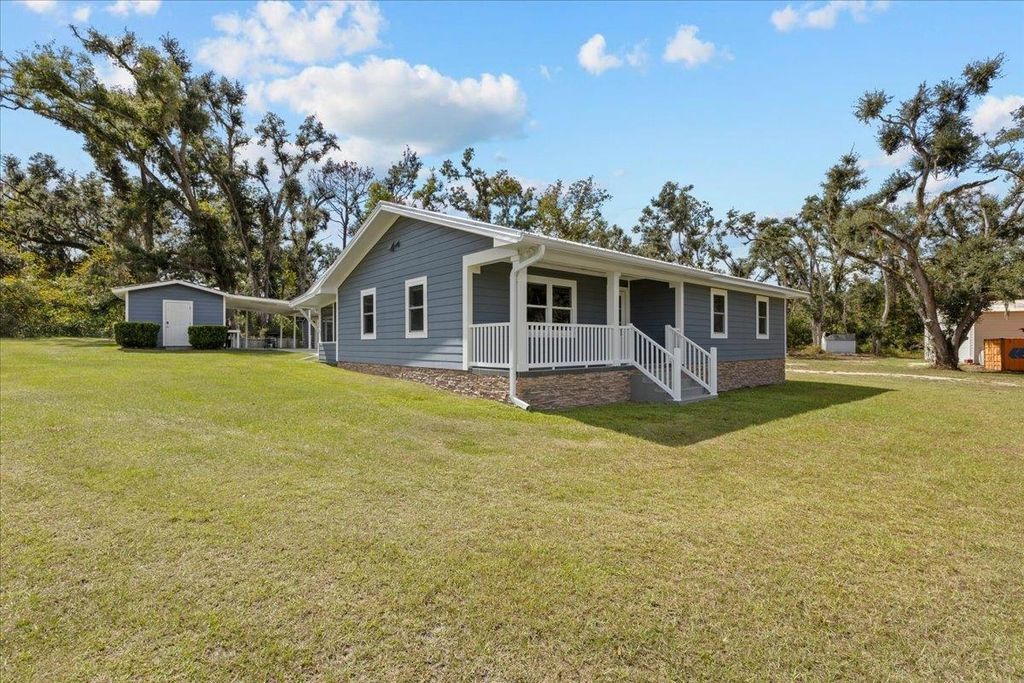Photo of 647 SE Regency Trail, Madison, FL 32340 (MLS # 392076)