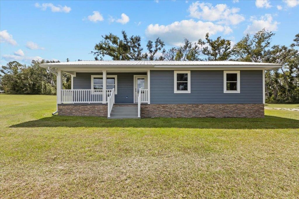 Photo of 647 SE Regency Trail, Madison, FL 32340 (MLS # 392076)