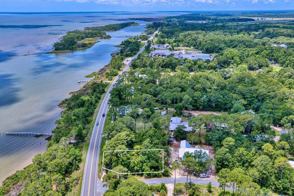 Photo of 104 Bay Colony Way, Apalachicola, FL 32320 (MLS # 400715)