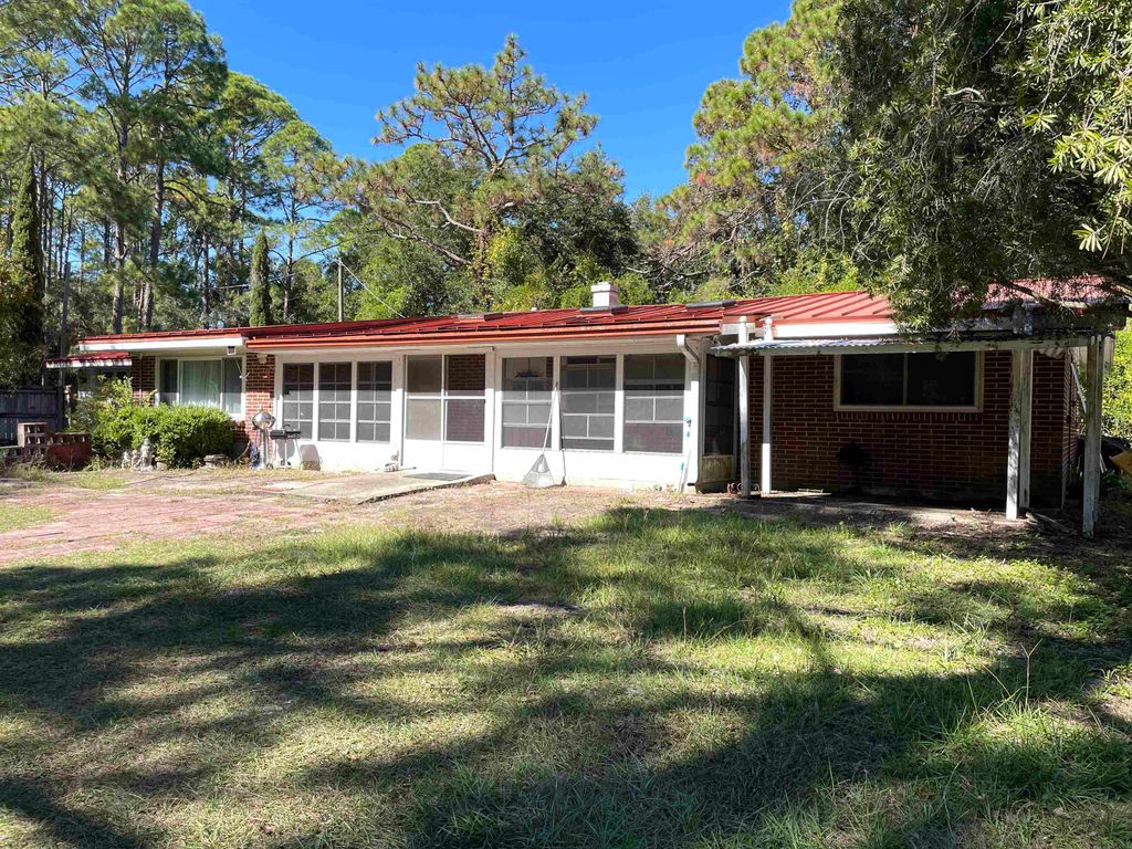 Photo of 119 Apalachee Street, Lanark Village, FL 32322 (MLS # 392806)
