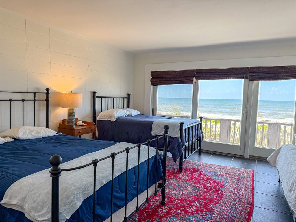 Photo of 548 W Gorrie Drive, St George Islan, FL 32328 (MLS # 387021)