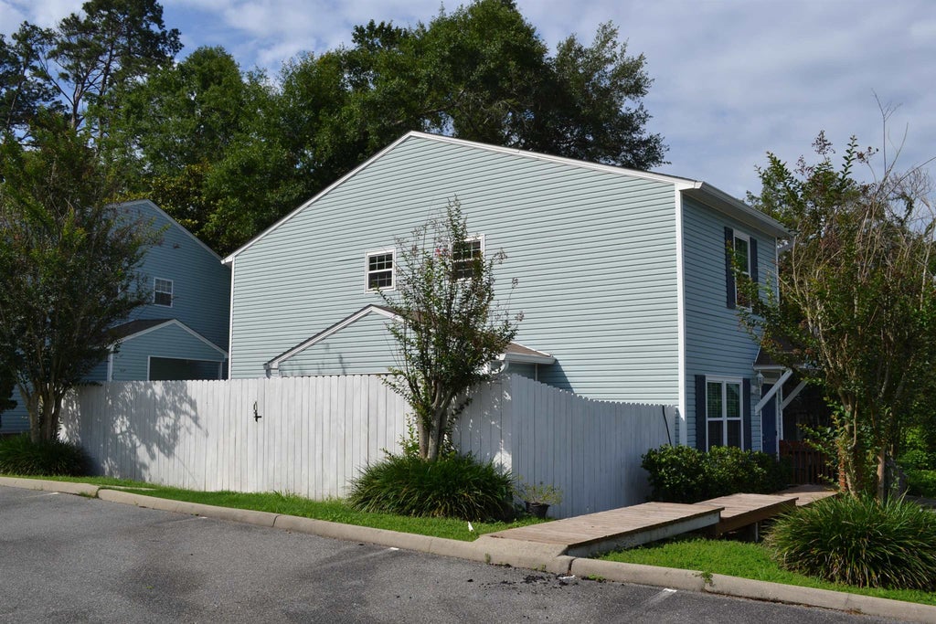 Photo of 697 E Timberwood Circle, Tallahassee, FL 32304 (MLS # 400850)