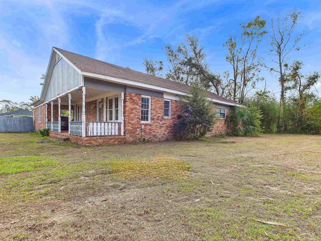 Photo of 608 Plantation Road, Perry, FL 32348 (MLS # 393144)