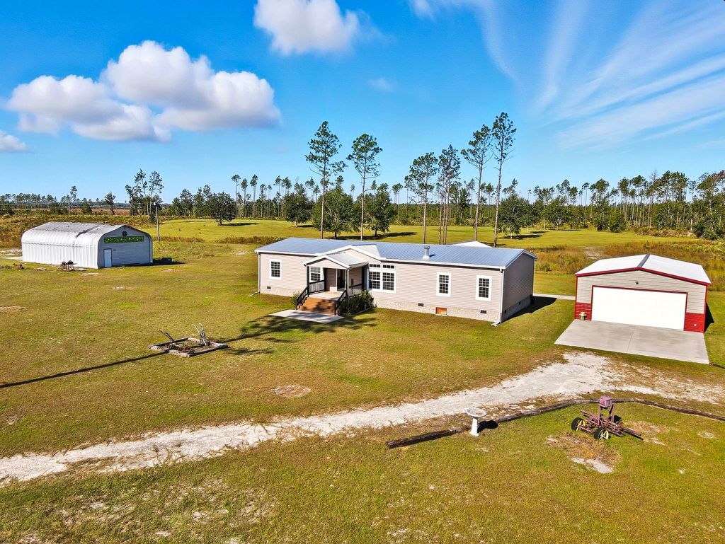 Photo of 641 SE Sequoyah Trail, Lee, FL 32059 (MLS # 398813)