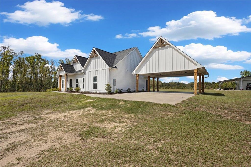 Photo of 371 NE Catnip Way, Lee, FL 32059 (MLS # 397615)