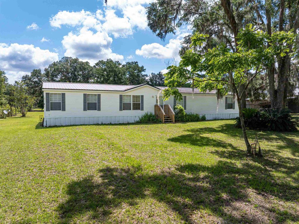 Photo of 113 SE Parker Rd Rd, Mayo, FL 32066 (MLS # 388442)