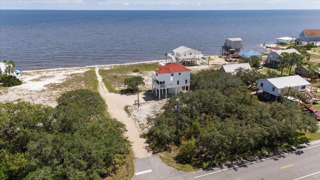 Photo of 6 Kingfish Street, Alligator Point, FL 32346 (MLS # 397373)