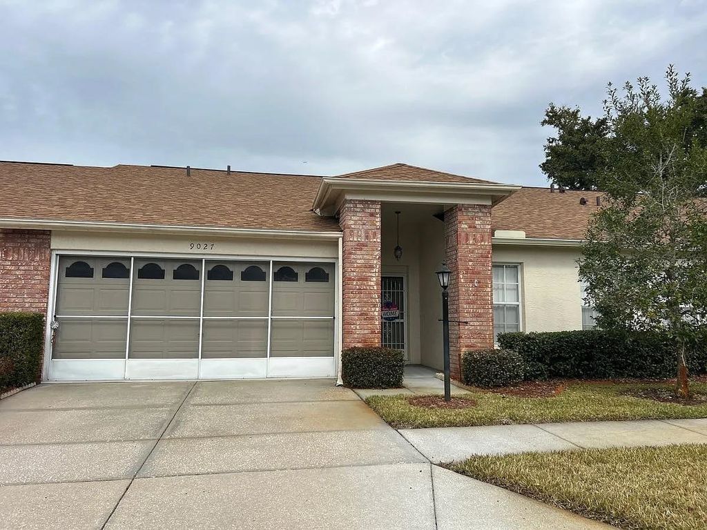 Photo of 9027 Warwick Lane, New Port Richey, FL 34655 (MLS # 396770)