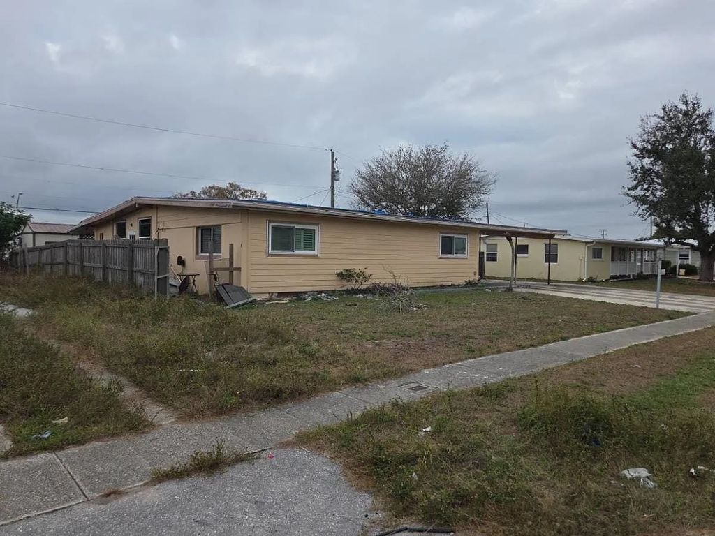 Photo of 844 Conreid Dr NE Dr, Other Florida, FL 33952 (MLS # 396265)