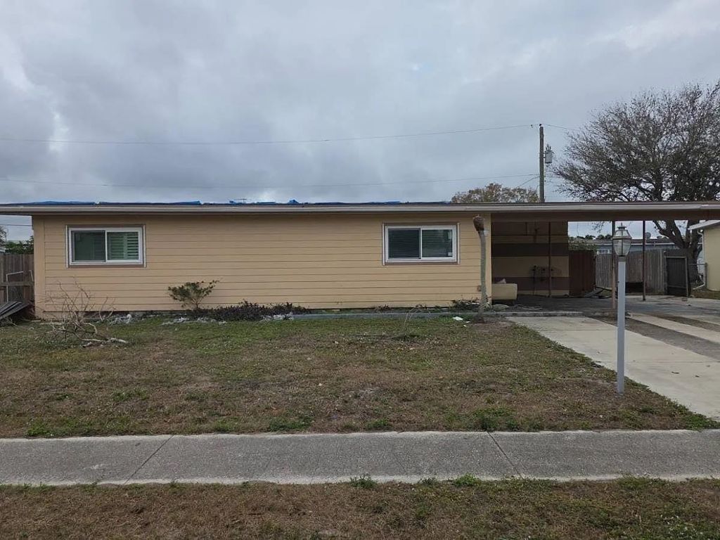 Photo of 844 Conreid Dr NE Dr, Other Florida, FL 33952 (MLS # 396265)