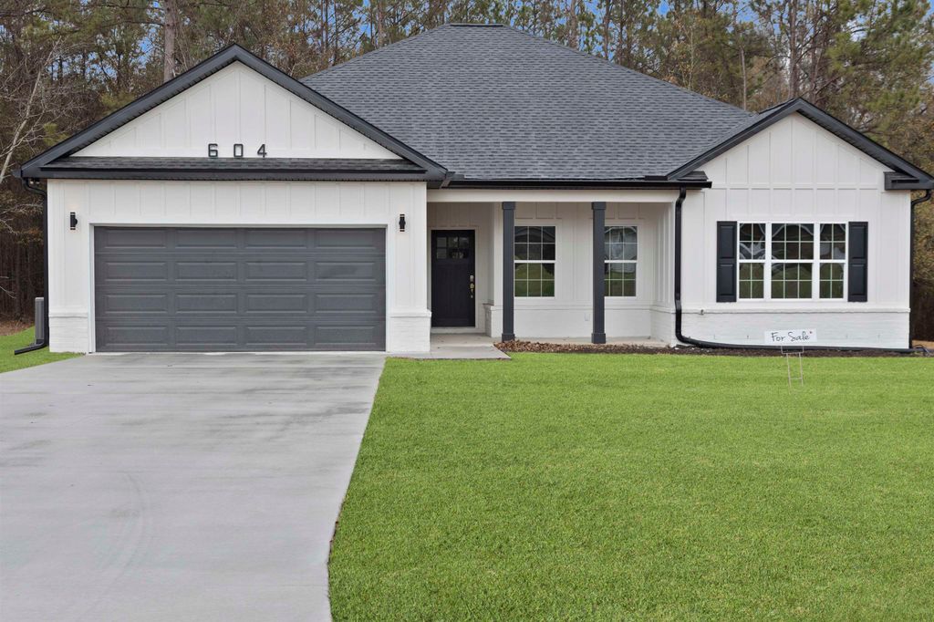 Photo of 604 RUSTLING PINES Boulevard, Midway, FL 32343 (MLS # 396029)