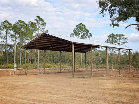 Photo of 18960 BEACH Road, Perry, FL 32348 (MLS # 397966)