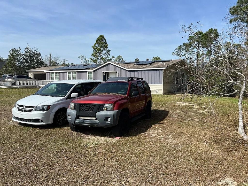 Photo of 8556 Bay River Road, Other Florida, FL 32566 (MLS # 397421)