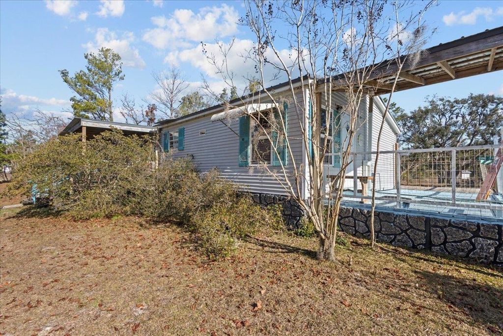 Photo of 15872 Stone Crab Drive, Perry, FL 32348 (MLS # 394841)