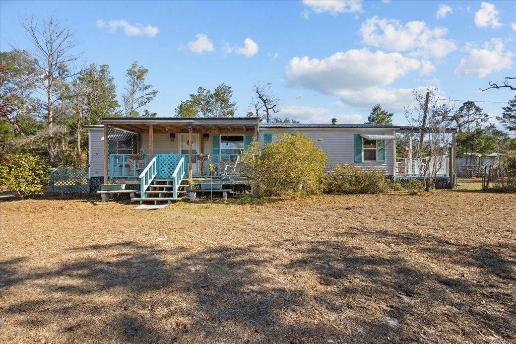 Photo of 15872 Stone Crab Drive, Perry, FL 32348 (MLS # 394841)