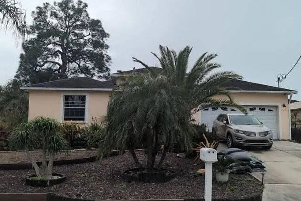 Photo of 7332 Winchester Drive, Tampa, FL 33615 (MLS # 396981)