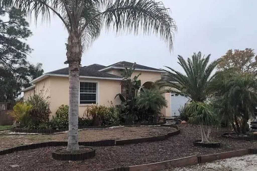 Photo of 7332 Winchester Drive, Tampa, FL 33615 (MLS # 396981)