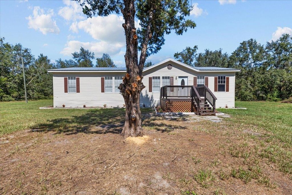 Photo of 18565 County Road 136, Live Oak, FL 32060 (MLS # 391764)