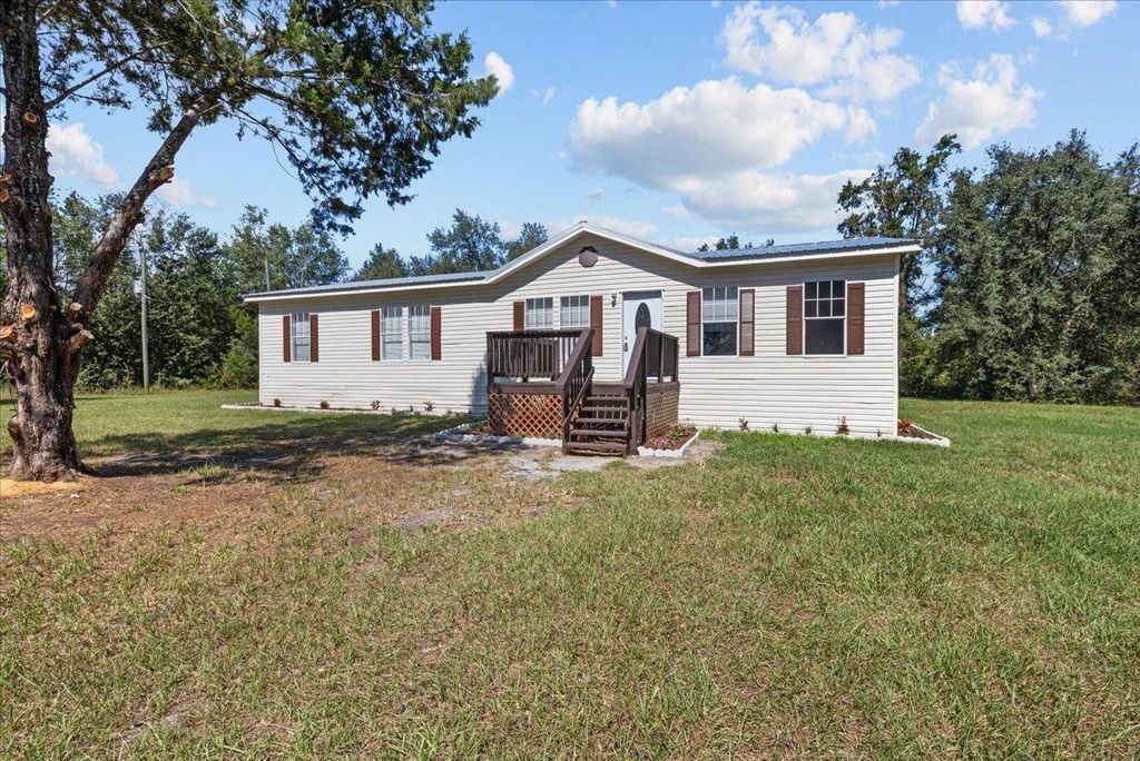 Photo of 18565 County Road 136, Live Oak, FL 32060 (MLS # 391764)