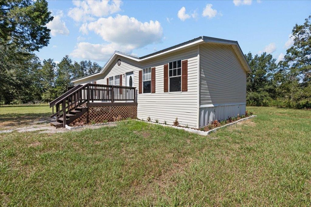 Photo of 18565 County Road 136, Live Oak, FL 32060 (MLS # 391764)
