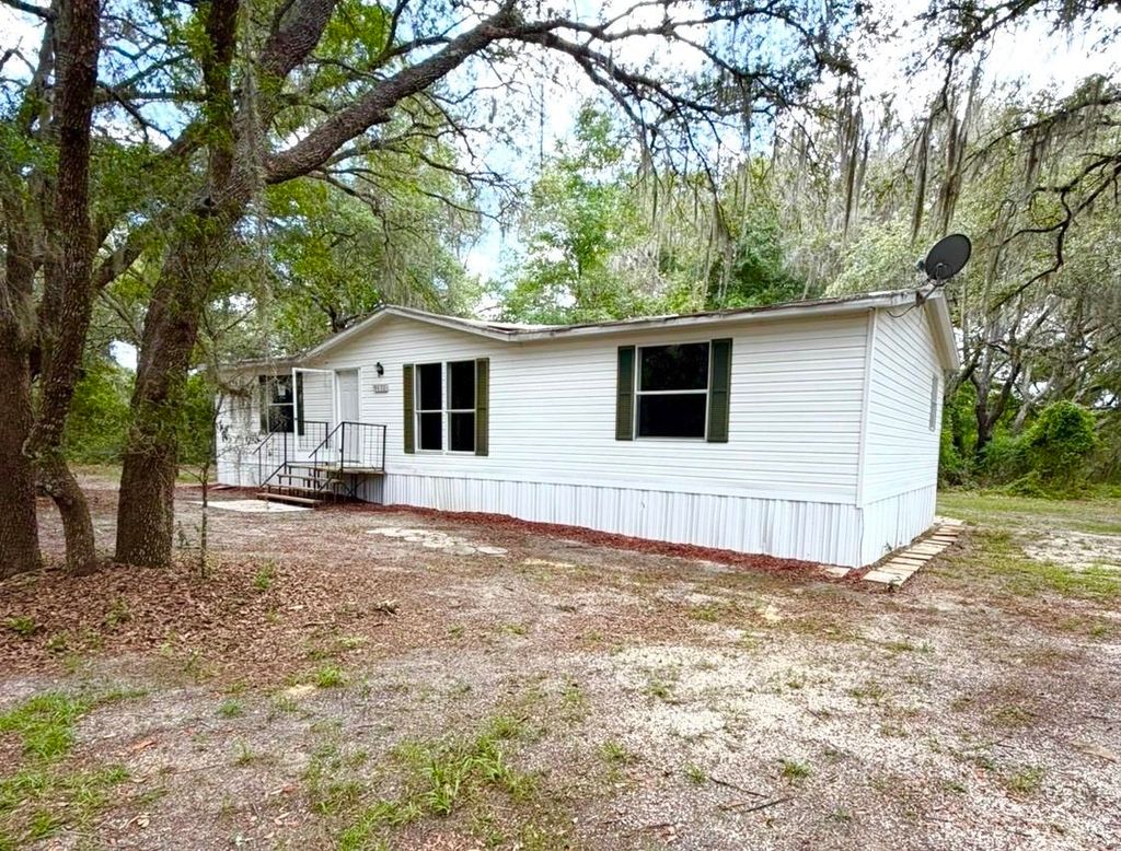 Photo of 9830 NE 105th Avenue, Other Florida, FL 32618 (MLS # 402810)