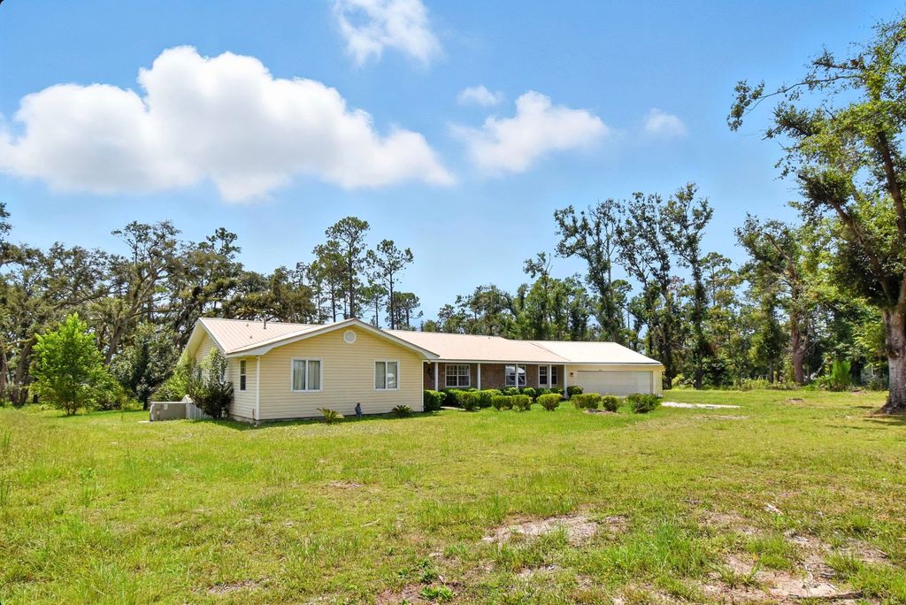 Photo of 593 E Ash Street, Perry, FL 32347 (MLS # 389858)