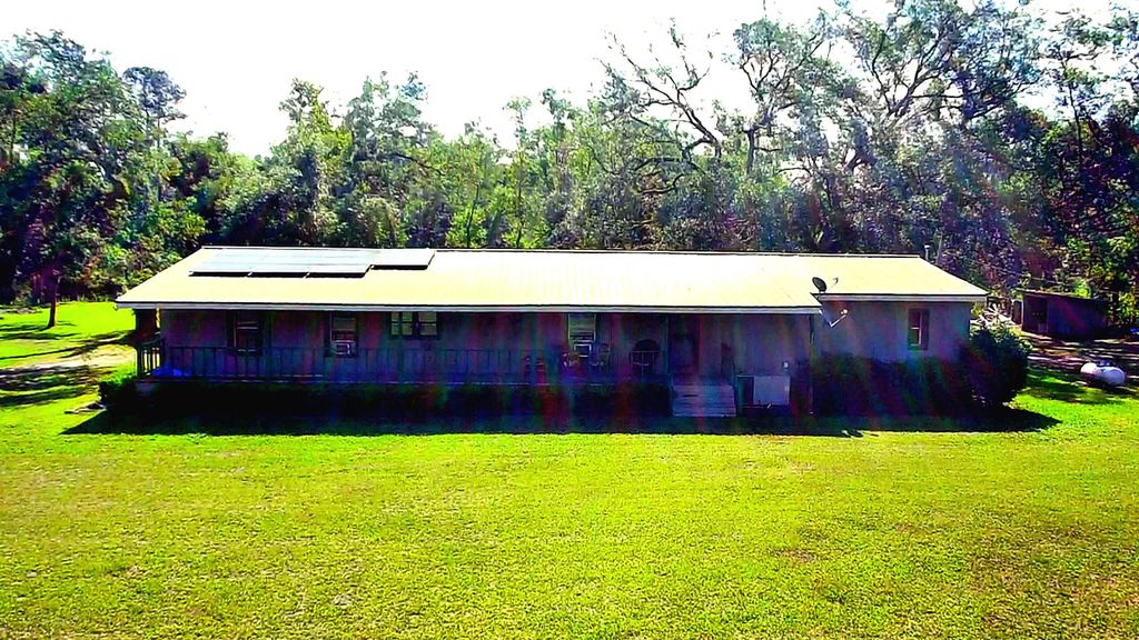 Photo of 585 Mangum Close Road, Perry, FL 32347 (MLS # 400172)