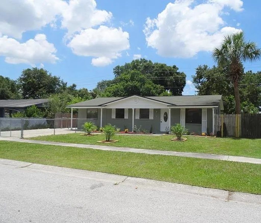 Photo of 6532 La Mesa Circle, Tampa, FL 33634 (MLS # 395132)