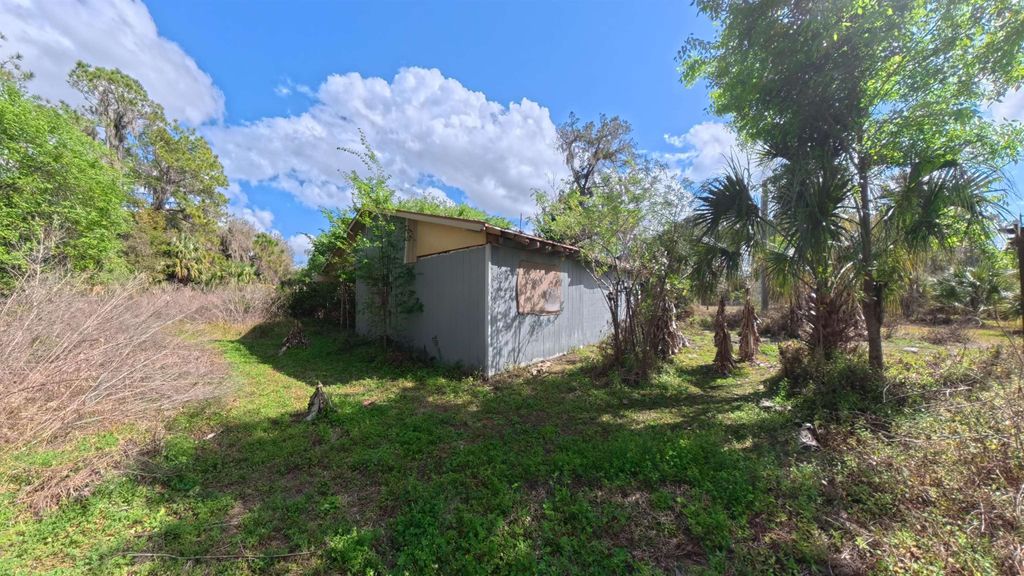 Photo of 1901 Hontoon Road, Other Florida, FL 32720 (MLS # 396736)