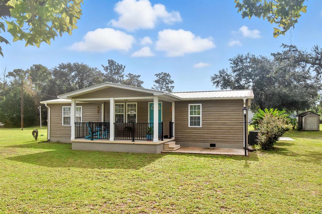 Photo of 935 Charles Hendry Road, Perry, FL 32348 (MLS # 389130)
