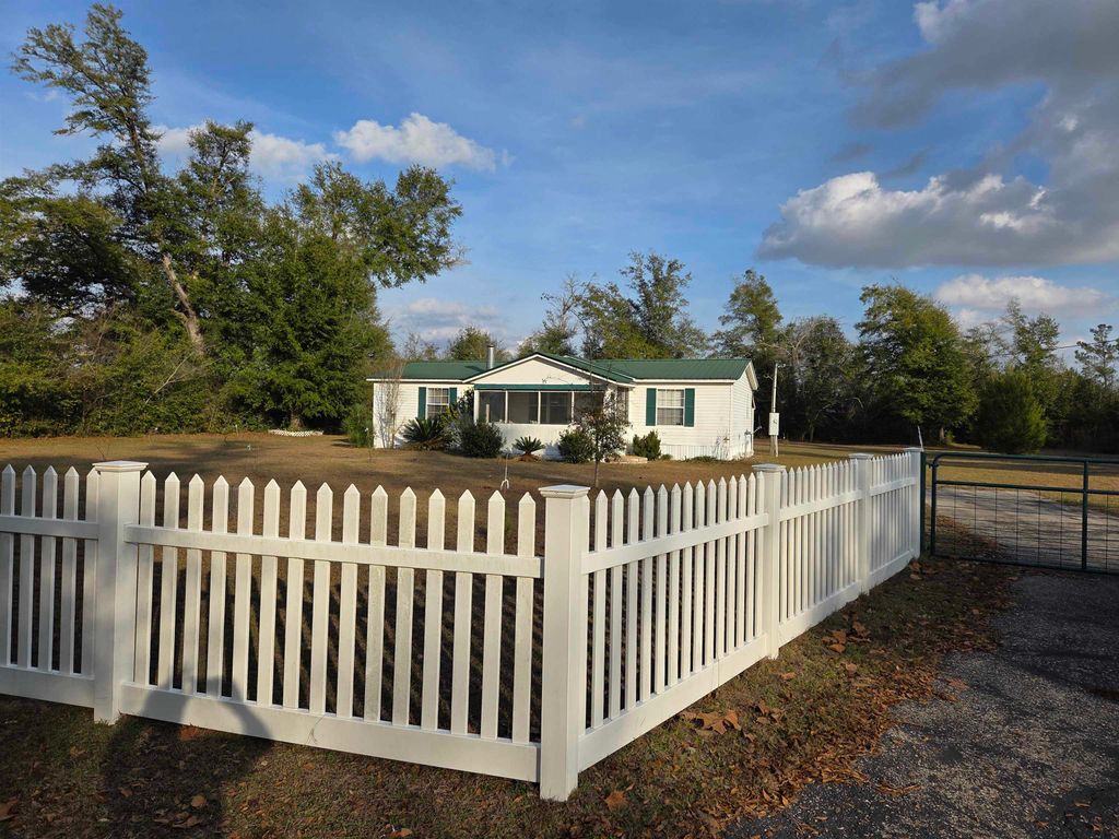 Photo of 17305 NW Creek Road, Clarksville, FL 32430 (MLS # 394827)