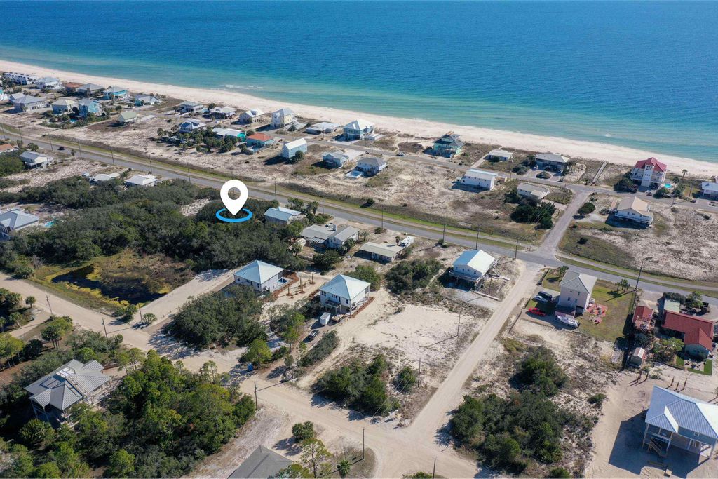 Photo of 449 W Gulf Beach Drive, St George Islan, FL 32328 (MLS # 392466)