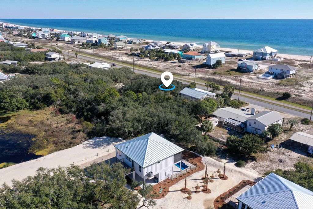 Photo of 449 W Gulf Beach Drive, St George Islan, FL 32328 (MLS # 392466)