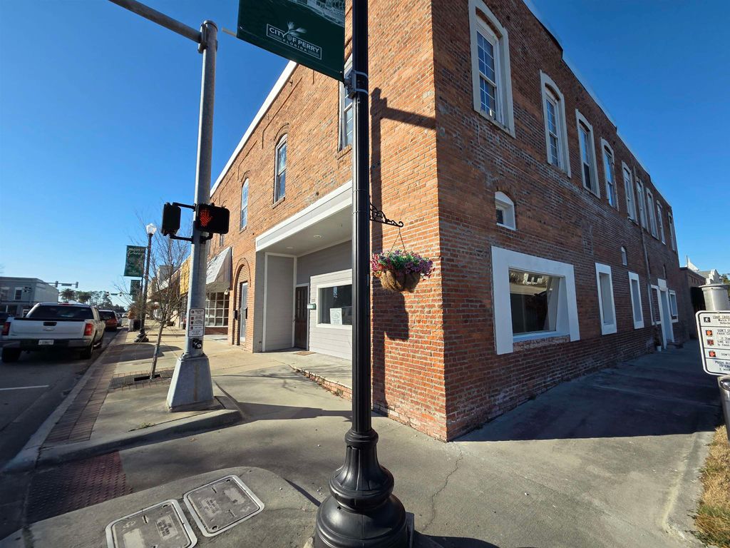 Photo of 131 N Jefferson Street, Perry, FL 32347 (MLS # 395742)