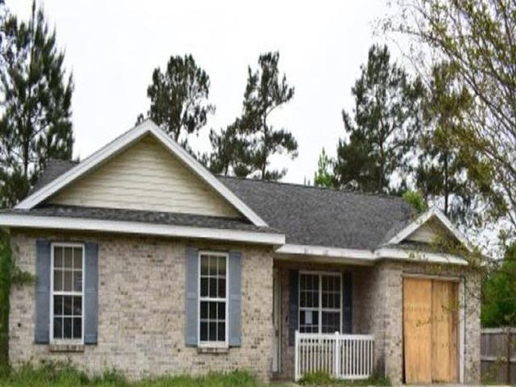 Photo of 633 RUSTLING PINES Boulevard, Midway, FL 32343 (MLS # 399909)