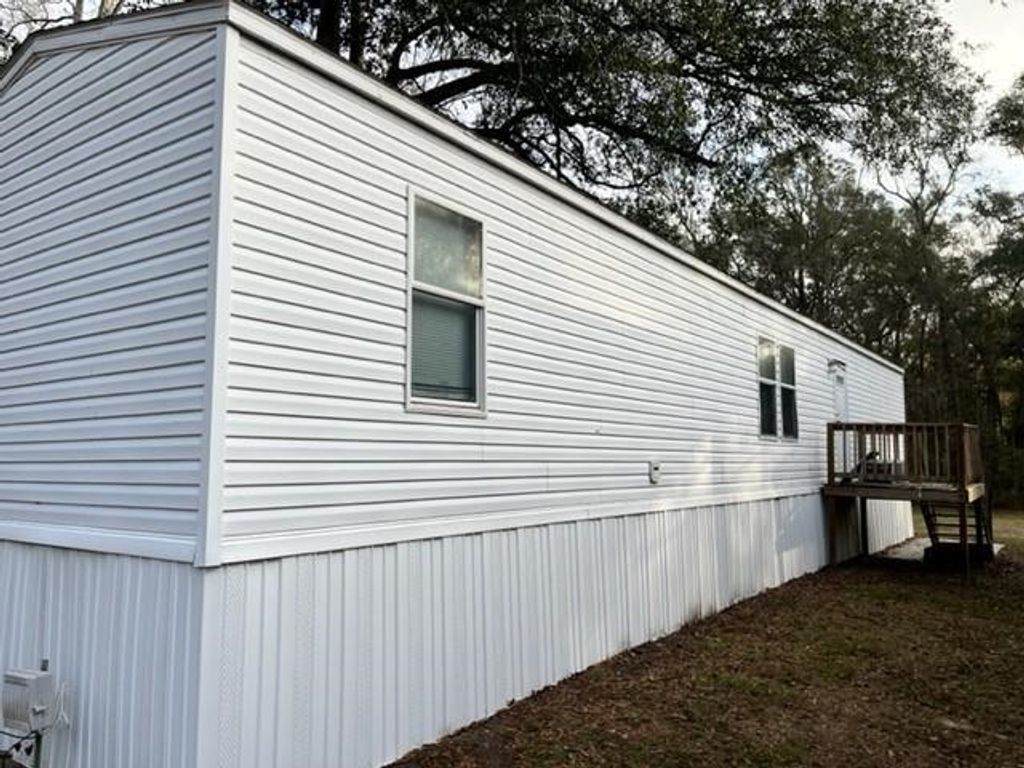Photo of 7587 Old St. Augustine Road, Tallahassee, FL 32311 (MLS # 400212)