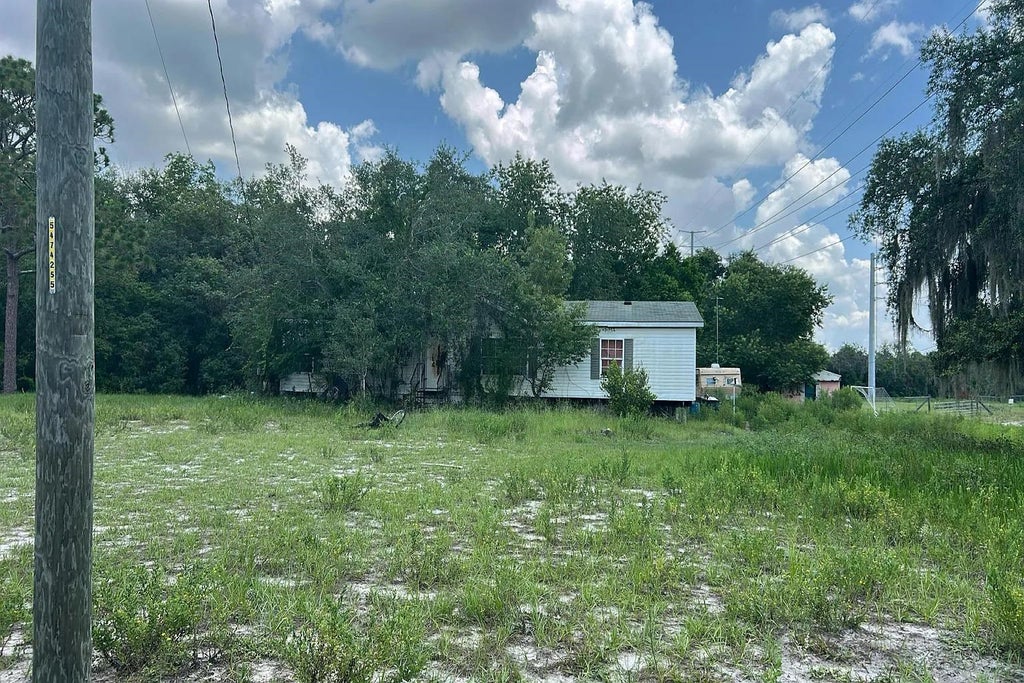 Photo of 5930 Miss Helen Road, Other Florida, FL 33844 (MLS # 402790)