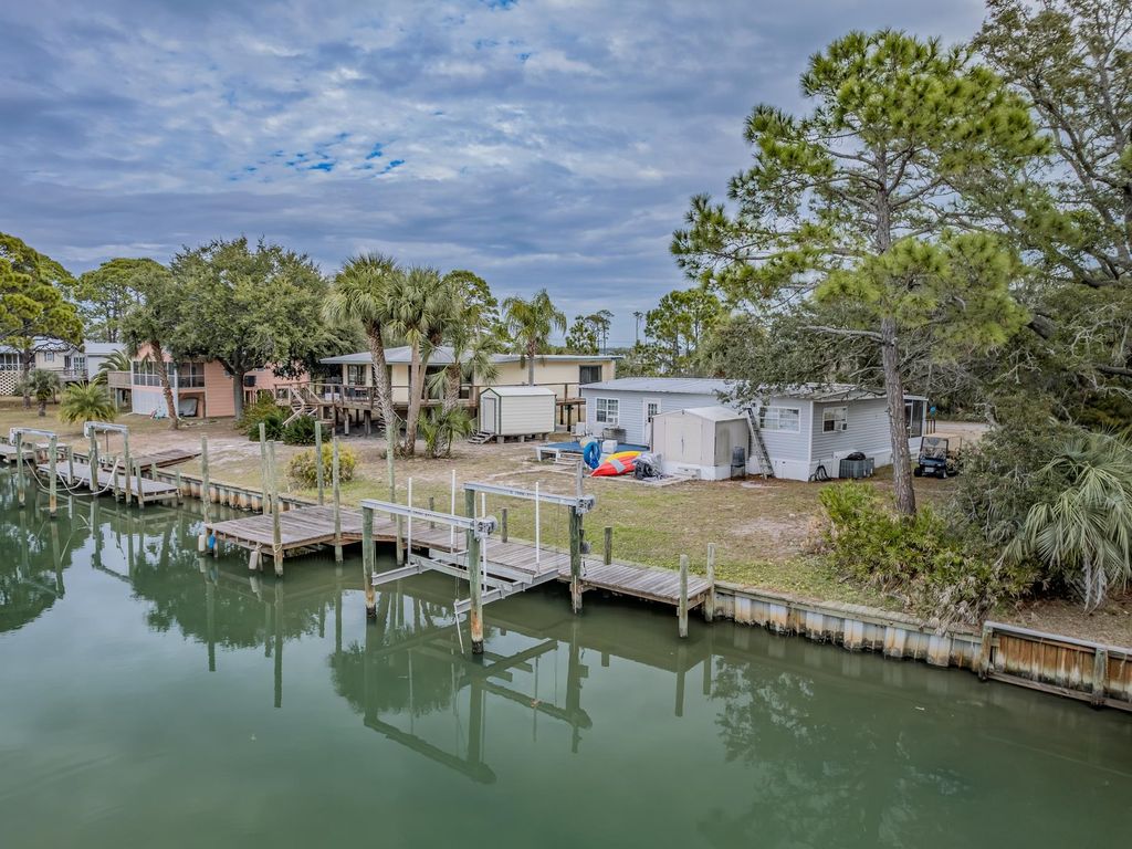 Photo of 24 Fiesta Drive, Alligator Point, FL 32346 (MLS # 394729)