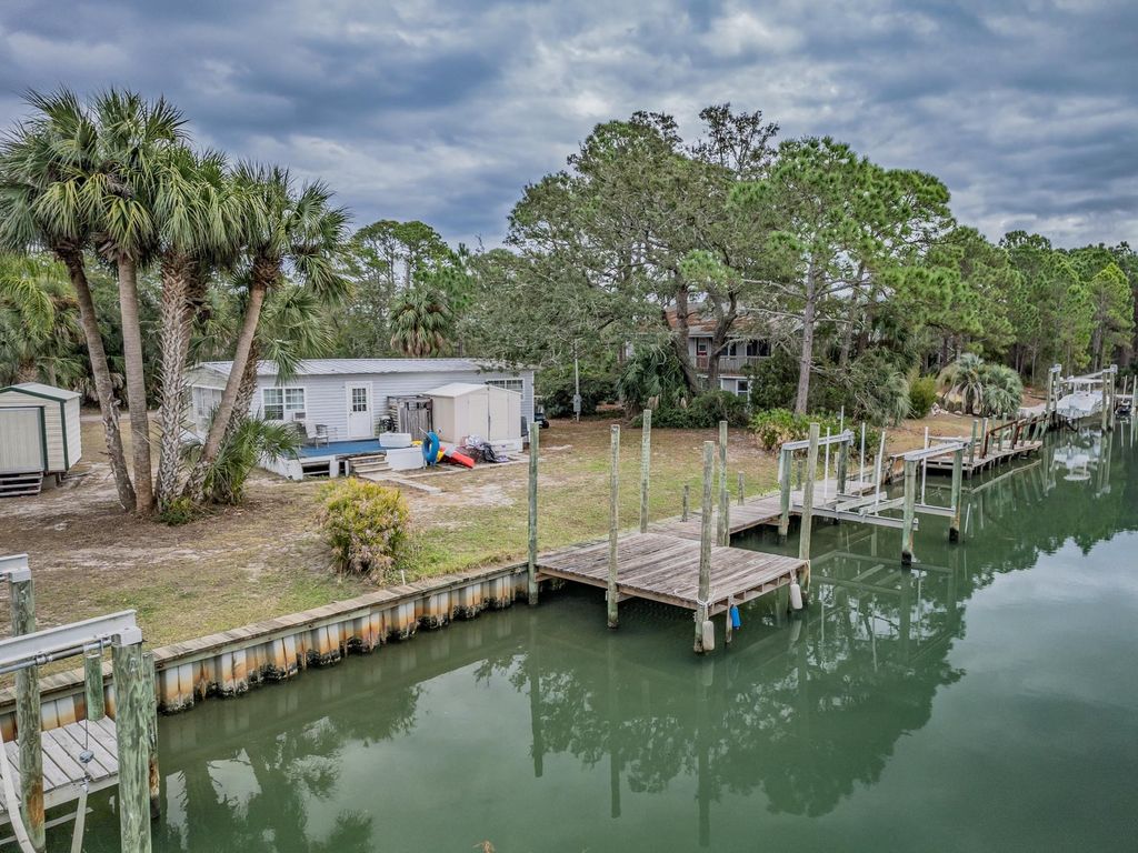 Photo of 24 Fiesta Drive, Alligator Point, FL 32346 (MLS # 394729)