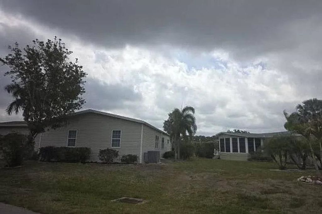Photo of 9954 Bardmoor Court, Other Florida, FL 33903 (MLS # 399872)