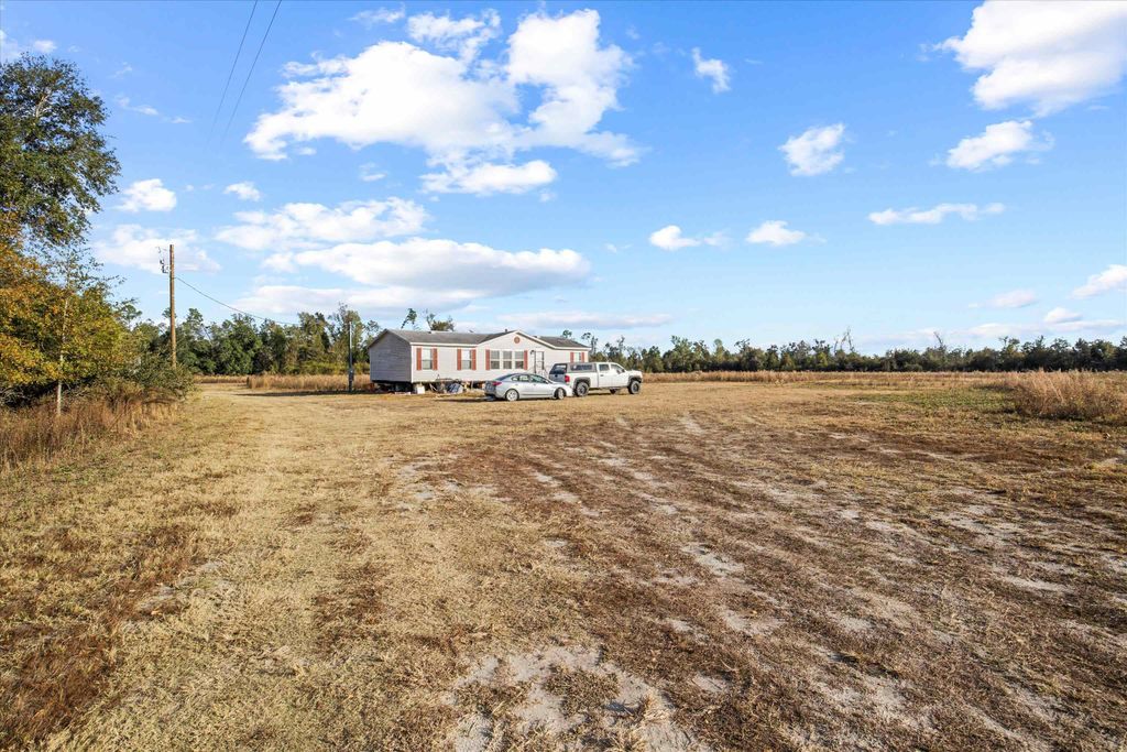 Photo of 644 Treeline Road, Grand Ridge, FL 32442 (MLS # 394351)