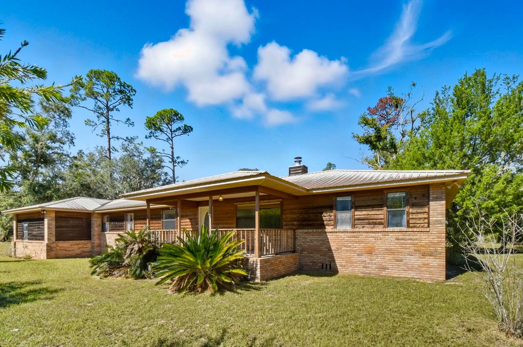 Photo of 154 W Davis Walker Road, Perry, FL 32348 (MLS # 392467)