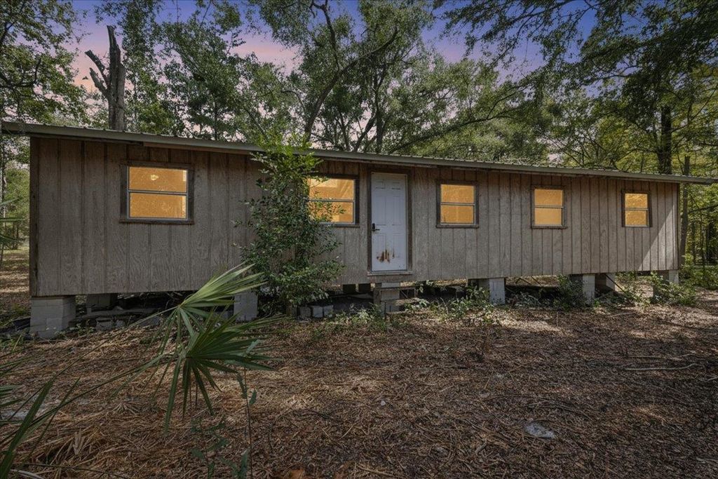 Photo of 7619 Canal Avenue, Fanning Springs, FL 32693 (MLS # 392424)