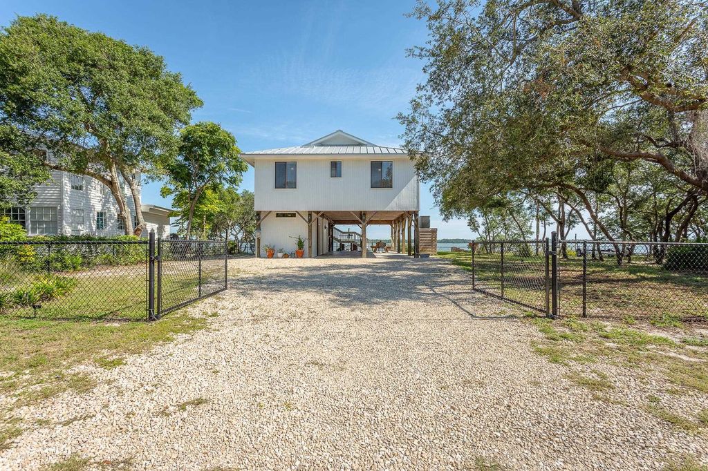 Photo of 203 &amp; 201 Harbor Circle, Alligator Point, FL 32346 (MLS # 390485)