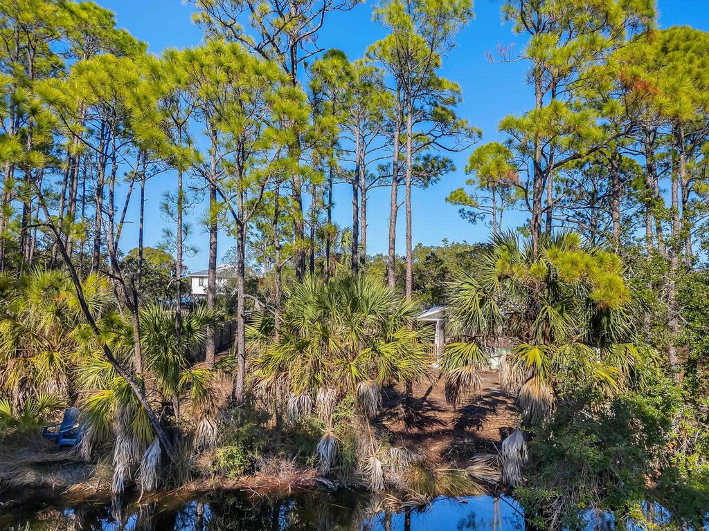 Photo of 202 Harbor Circle, Alligator Point, FL 32346 (MLS # 400696)