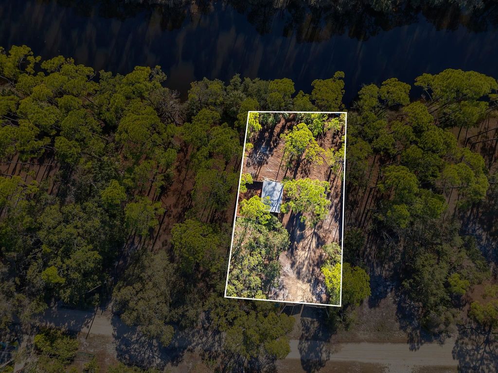 Photo of 202 Harbor Circle, Alligator Point, FL 32346 (MLS # 400696)