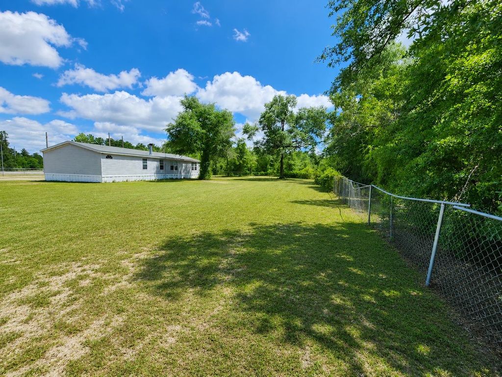 Photo of 16045 NE State Road 65, Hosford, FL 32334 (MLS # 399886)